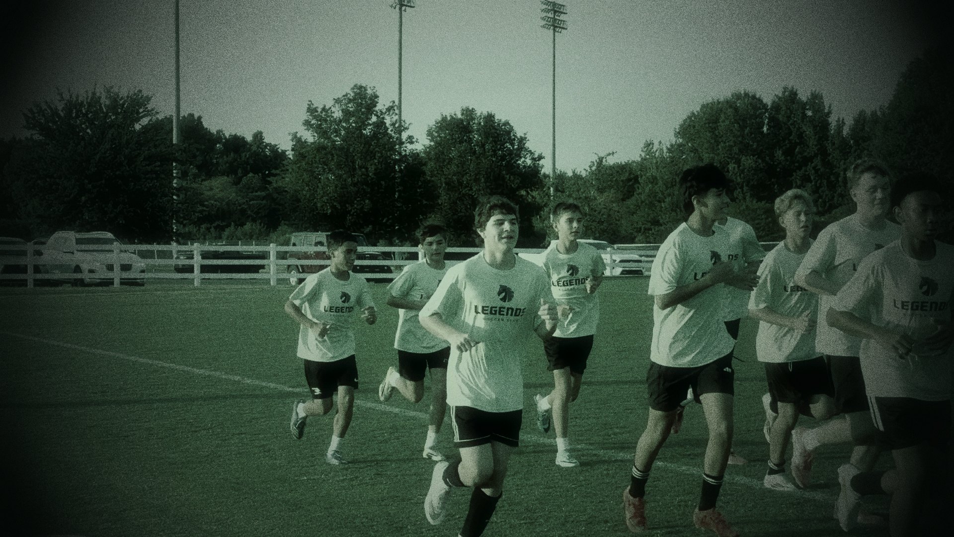 Germantown Legends squad running a warm-up lap at training